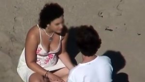Tongue kissing at the beach escorted by amateur
